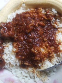 A picture of Banana wt white rice n stew.