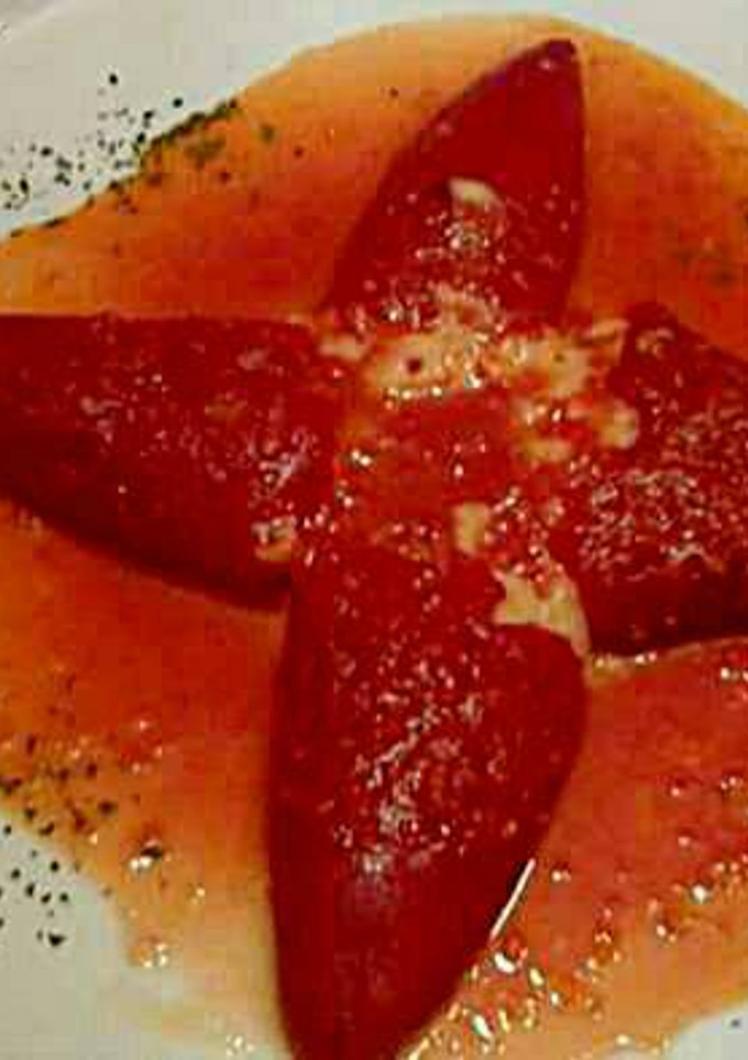 Una foto de Pimientos del piquillo rellenos de bacalao y gambas