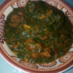 A picture of Fresh moringa and dry okro soup.