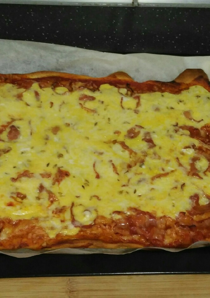 Una foto de Pizza australiana