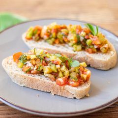 A picture of Bruschetta With Green Tomato and Thai Basil 🌿 🍅.