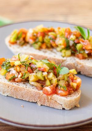 A picture of Bruschetta With Green Tomato and Thai Basil 🌿 🍅.