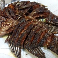 A picture of Turmeric fried fish.