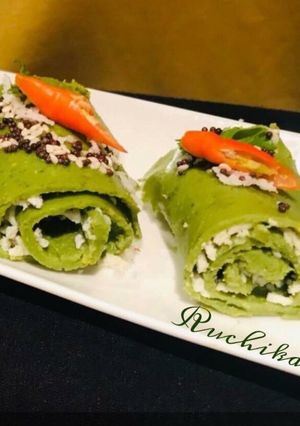 A picture of Paneer stuffed palak khandavi.