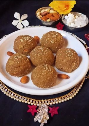 A picture of Churma ladoo with jaggery (traditional Gujrati sweet).