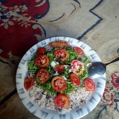 A picture of Local rice nd beans with lattice.