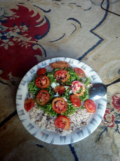 A picture of Local rice nd beans with lattice.