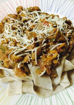 A picture of Eggplant Caponata on Eggless Basil Pappardelle.