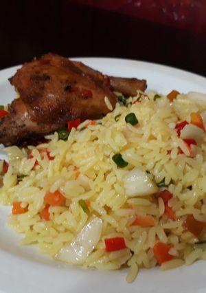 A picture of Fried rice with chicken.
