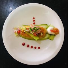 A picture of Vegetable cutlets serve with salad.