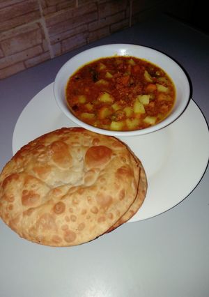 A picture of Puri with potato dutch soup.
