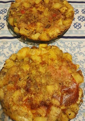 Una foto de Tortilla de papas rellena
