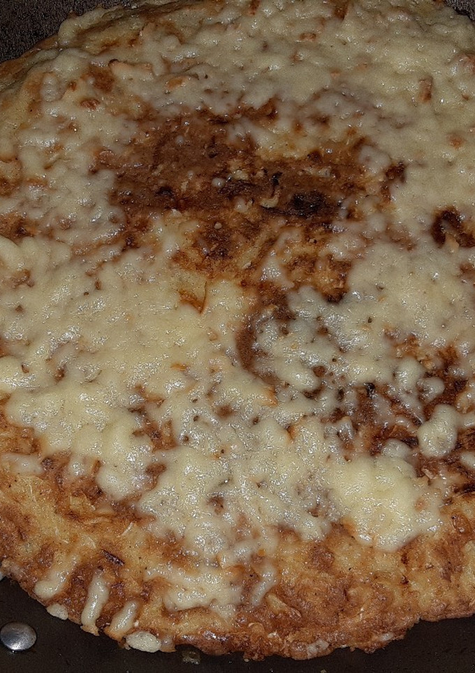 Una foto de Pastel de repollo con queso derretido