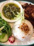 Indonesian deep fried duck with green chili sambal and crunchy bits
