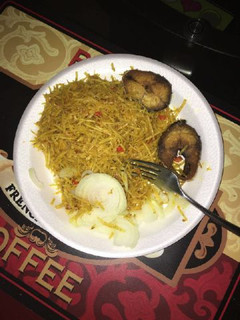 A picture of Abacha with fried Titus fish.