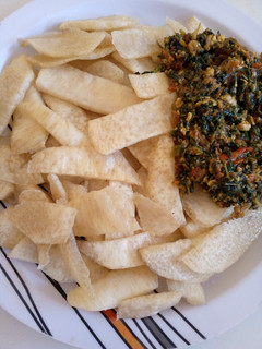 A picture of Fried yam with veg source.