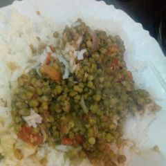 A picture of Rice and ndengu.