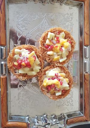 A picture of Delightful dessert-Fruit custard basket.