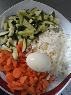 A picture of Vegetables with boiled egg.
