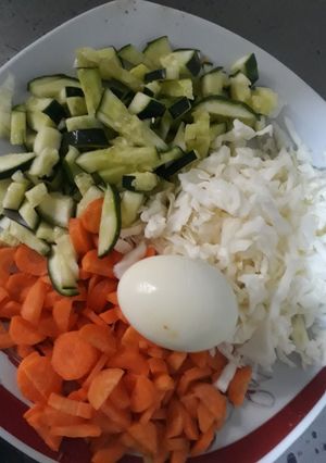 A picture of Vegetables with boiled egg.