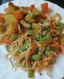 Ejotes salteados con pollo y verduras con orégano y jengibre