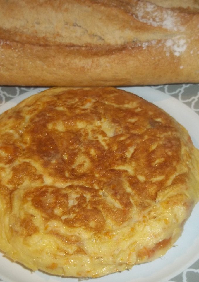 Una foto de Tortilla de calabaza y dientes de ajo