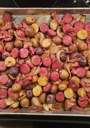 A picture of Sheet pan sausage, potatoes, and bacon.