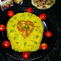 A picture of Zeera Rice with aloo curry in unique style.