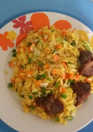 A picture of Fried rice with beef.
