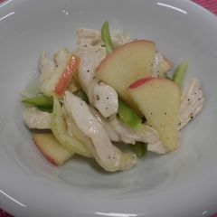 A picture of Marinated chicken breast with apple and aromatic vegetables.