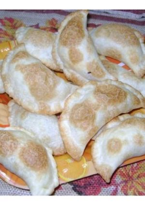 Una foto de Empanadillas con verdeo, jamón, queso y huevo batido