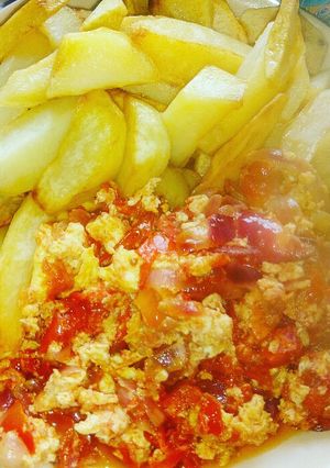 A picture of Fried Irish potatoes with egg sauce.