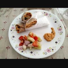 A picture of Paneer and fresh veggie Tortilla wrap.