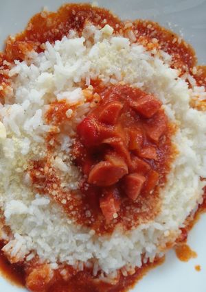 Una foto de Arroz con salsa