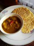Roti canai and chicken curry