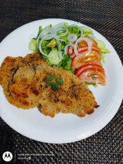 Una foto de Milanesas de pollo al horno