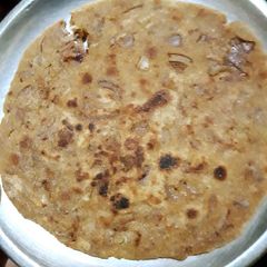 A picture of Onion stuffed paratha.