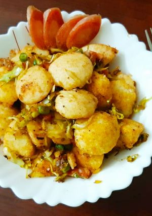A picture of Schezwan mini idlis.