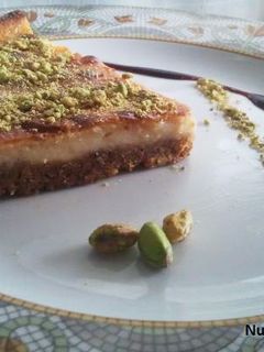 Una foto de Tarta de queso de cabra y pistachos