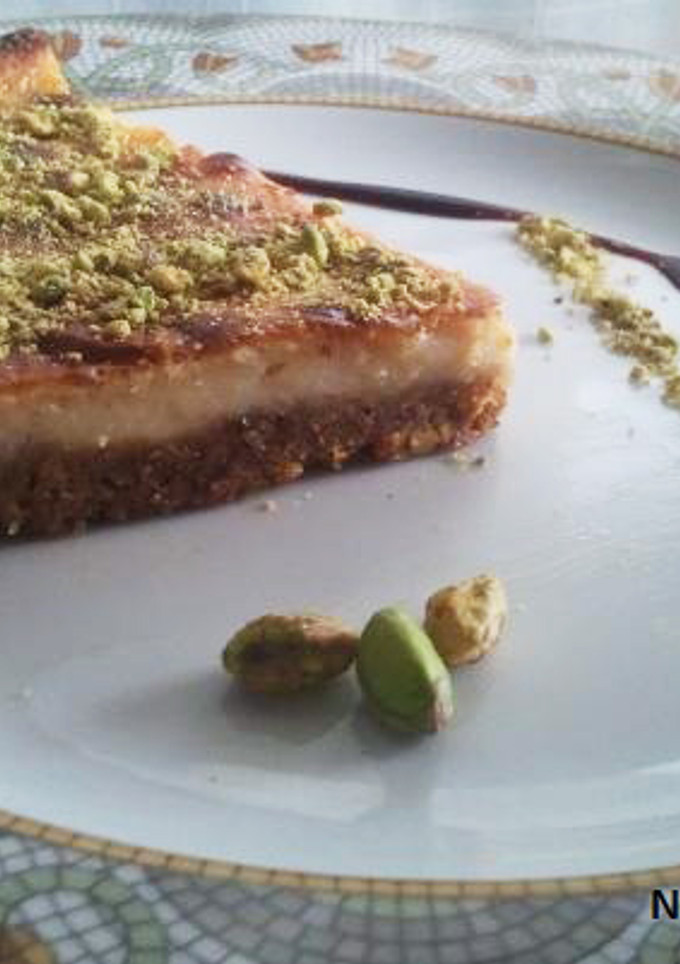 Una foto de Tarta de queso de cabra y pistachos