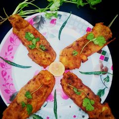 A picture of Fish pur with brinjal.
