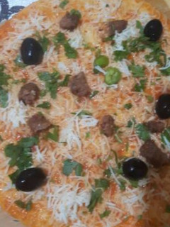 صورة لوصفة بيتزا الطاجين ولا اروع