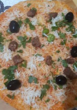 صورة لوصفة بيتزا الطاجين ولا اروع