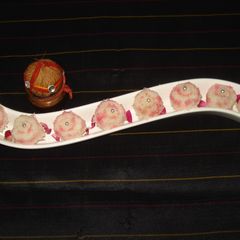 A picture of Nariyal –Malai –Rosy coins.