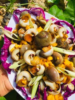Hình của món Ốc mỡ xào bơ tỏi.