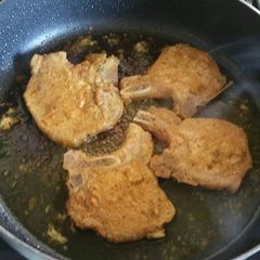 A picture of Stovetop Porkchops with honey mustard red wine glaze.