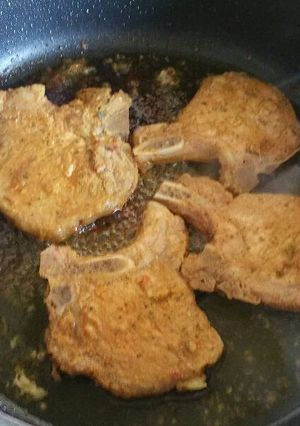 A picture of Stovetop Porkchops with honey mustard red wine glaze.