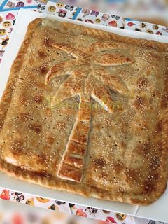 Una foto de Empanada tropical 🌴 (piña, jamón braseado y queso)🍍