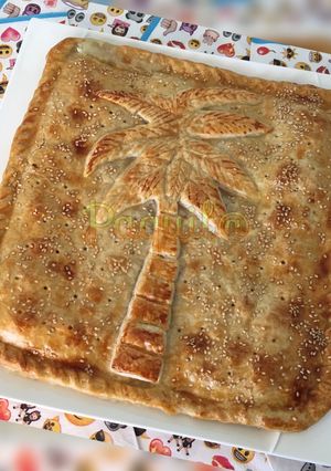 Una foto de Empanada tropical 🌴 (piña, jamón braseado y queso)🍍