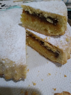 Una foto de Tarta de Ricota con dulce de leche
